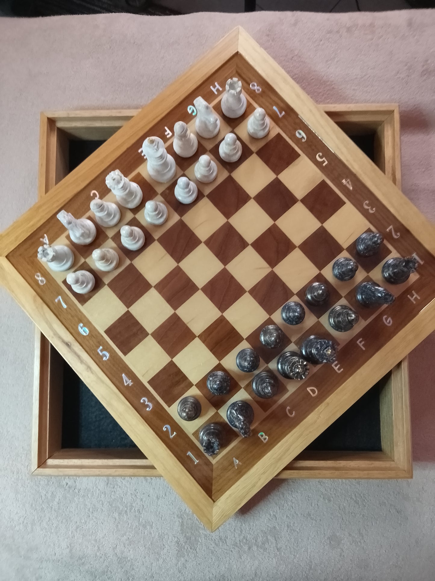 Handcrafted chess set, black and white, available without a chessboard. Various colors available upon request.