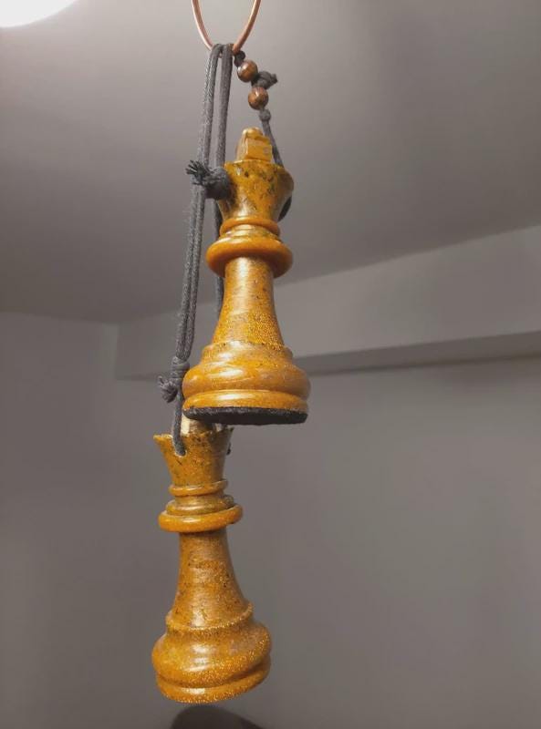 Hanging ornaments for a couple in the form of chess