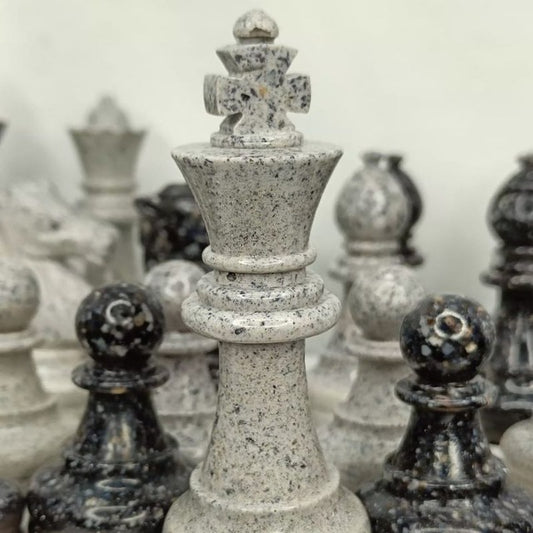 Handcrafted chess set, black and white, available without a chessboard. Various colors available upon request.