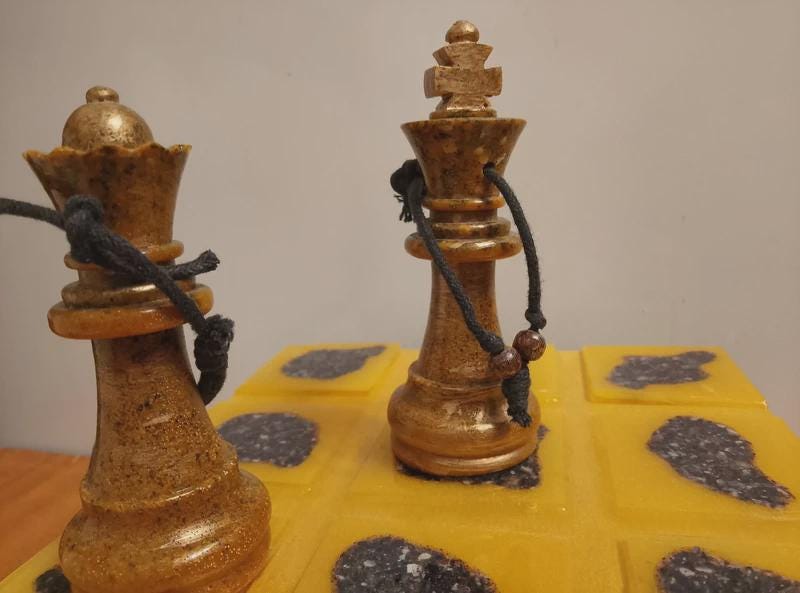 Hanging ornaments for a couple in the form of chess